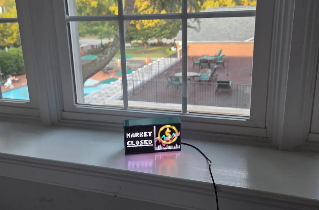Beekon Light showing pixel art of a gold coin next to the words market closed